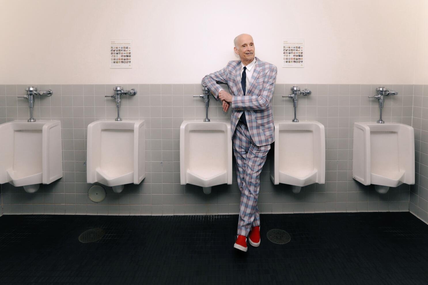 LOS ANGELES, CA - MAY 10, 2022 - - Ladies and gentlemen the, "Pope of Trash" and the "King of Puke," director John Waters strikes an elegant form before a discussion and book signing for his first book of fiction, "Liarmouth," at the Aratani Theater in Los Angeles on May 10, 2022. Waters has written several non-fiction books like, "Carsick," "Make Trouble," "Role Models," and "Mr. Know-It-All.:" Waters has been a film provocateur and camp legend for years with films such as, "Pink Flamingos," Female Trouble," "Cry Baby," "Polyester," "Hairspray," "Pecker," and "Serial Mom." (Genaro Molina / Los Angeles Times)